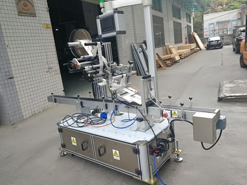 Кина Машина за етикетирање на налепници за тип на млазница за торбички електрично управувано снабдувач